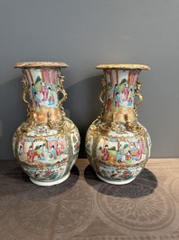 A pair of Chinese Canton famille rose vases with narrative design, 19th C.
