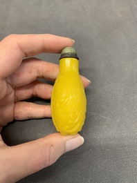 A Chinese yellow Peking glass 'elephant' snuff bottle, Xing You Heng Tang 行有恆堂 mark, 19th C.