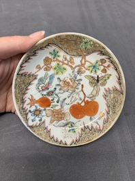 Three Chinese famille rose 'flowers and butterflies' cups and saucers, Yongzheng