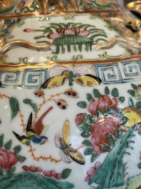 A pair of Chinese Canton famille rose vases with narrative design, 19th C.
