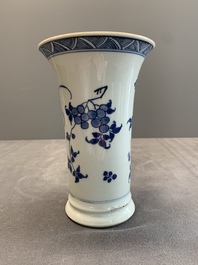 A pair of Chinese blue and white beaker vases with floral sprigs, Transitional period