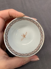 Three Chinese famille rose 'flowers and butterflies' cups and saucers, Yongzheng