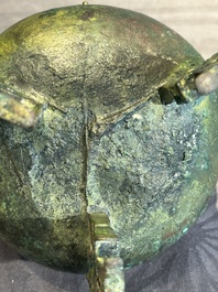 A rare Chinese archaic bronze tripod ritual food vessel, 'ding 鼎', Shang