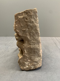 An Indian architectural red sandstone fragment with divinities, 13th C.