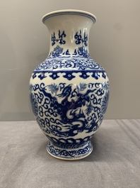 A Chinese blue and white 'phoenix and flower scroll' vase, Qianlong mark, 19th C.