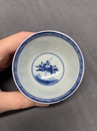 Five Chinese caf&eacute;-au-lait-ground blue and white cups and four saucers, conical shell mark, Kangxi