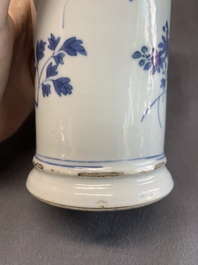 A pair of Chinese blue and white beaker vases with floral sprigs, Transitional period