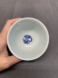 A Chinese blue and white 'dragon' cup, Kangxi mark, 19/20th C.