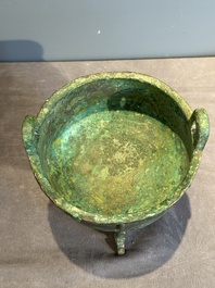 A rare Chinese archaic bronze tripod ritual food vessel, 'ding 鼎', Shang