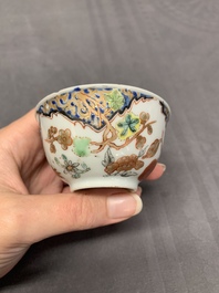 Three Chinese famille rose 'flowers and butterflies' cups and saucers, Yongzheng