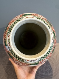 A Chinese famille verte 'mythical animal' vase and two Canton famille rose vases, 19th C.