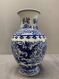 A Chinese blue and white 'phoenix and flower scroll' vase, Qianlong mark, 19th C.