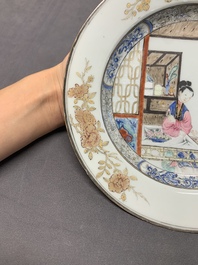 A Chinese famille rose 'lady and boy' plate, Yongzheng/Qianlong