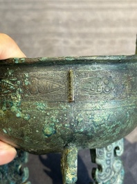 A rare Chinese archaic bronze tripod ritual food vessel, 'ding 鼎', Shang