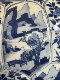 A Chinese blue and white vase and cover with landscapes and flowers, Kangxi
