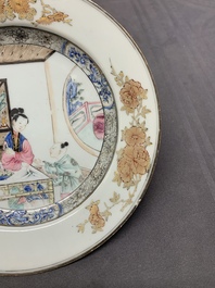 A Chinese famille rose 'lady and boy' plate, Yongzheng/Qianlong