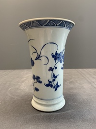 A pair of Chinese blue and white beaker vases with floral sprigs, Transitional period