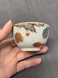 Three Chinese famille rose 'flowers and butterflies' cups and saucers, Yongzheng