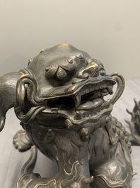 A pair of fine Chinese bronze Buddhist lions, 17/18th C.