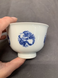 A Chinese blue and white 'dragon' cup, Kangxi mark, 19/20th C.