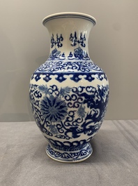 A Chinese blue and white 'phoenix and flower scroll' vase, Qianlong mark, 19th C.