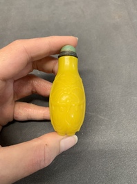 A Chinese yellow Peking glass 'elephant' snuff bottle, Xing You Heng Tang 行有恆堂 mark, 19th C.
