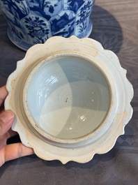 A Chinese blue and white vase and cover with landscapes and flowers, Kangxi