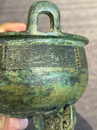 A rare Chinese archaic bronze tripod ritual food vessel, 'ding 鼎', Shang