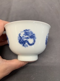 A Chinese blue and white 'dragon' cup, Kangxi mark, 19/20th C.