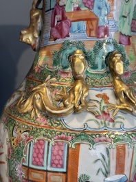 A Chinese famille verte 'mythical animal' vase and two Canton famille rose vases, 19th C.