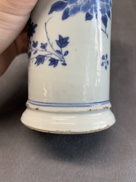 A pair of Chinese blue and white beaker vases with floral sprigs, Transitional period