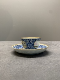 A Chinese export famille rose cup and saucer with a herring merchant, Qianlong