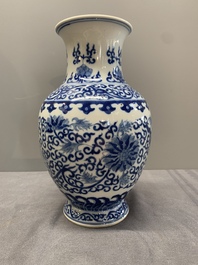 A Chinese blue and white 'phoenix and flower scroll' vase, Qianlong mark, 19th C.