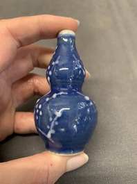 Three Chinese powder blue-ground blue and white snuff bottles and one blue and white snuff bottle, 19th C.