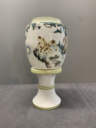 A Chinese polychrome-decorated eggshell 'monkeys' lantern on stand, 20th C.