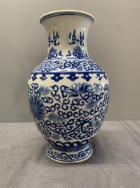 A Chinese blue and white 'phoenix and flower scroll' vase, Qianlong mark, 19th C.