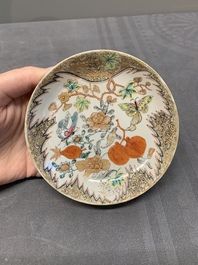 Three Chinese famille rose 'flowers and butterflies' cups and saucers, Yongzheng