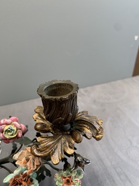 A pair of candle holders mounted with Chinese famille rose models of pheasants, Qianlong