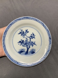 Five Chinese caf&eacute;-au-lait-ground blue and white cups and four saucers, conical shell mark, Kangxi
