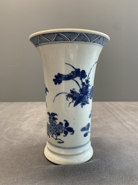 A pair of Chinese blue and white beaker vases with floral sprigs, Transitional period