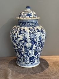 A Chinese blue and white vase and cover with landscapes and flowers, Kangxi