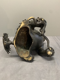 A pair of fine Chinese bronze Buddhist lions, 17/18th C.