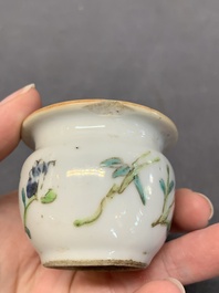 A collection of nine Chinese blue and white, monochrome and famille rose bird feeders, 19th C.