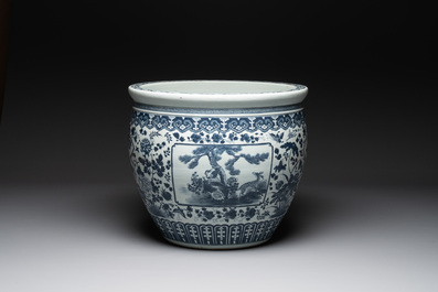 A large Chinese blue and white fish bowl with birds, deer, insects and flowering branches, 19th C.