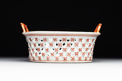 A Chinese openworked famille rose 'antiquities' basket and stand, Qianlong