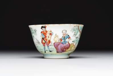A Dutch-decorated Chinese porcelain cup and saucer with figures in a landscape, 18th C.