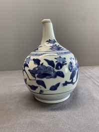 Three Japanese blue and white Arita 'birds among flowering branches' pharmacy bottles, Edo, 18th C.