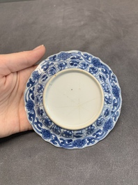 Six Chinese blue and white 'acupuncture' saucers, Kangxi