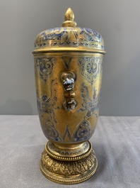 A Chinese gilt-ground blue and white lidded beaker on a French gilt bronze foot, Kangxi