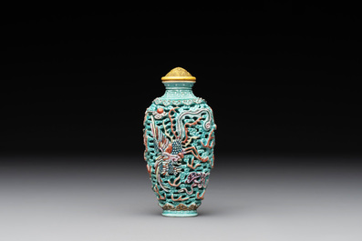 A Chinese moulded turquoise-ground famille rose 'dragon and phoenix' snuff bottle, 19th C.